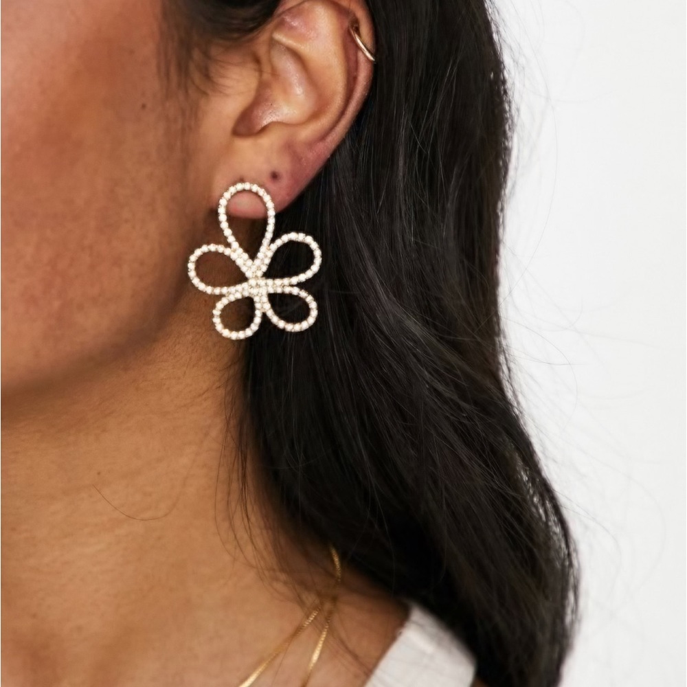 ASOS DESIGN oversized stud earrings with floral crystal design in gold tone
